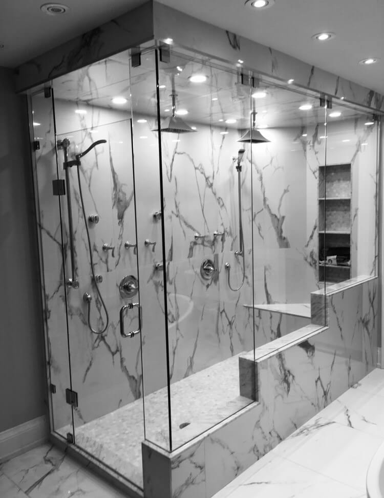 Frameless glass shower install by Access Glass Inc.